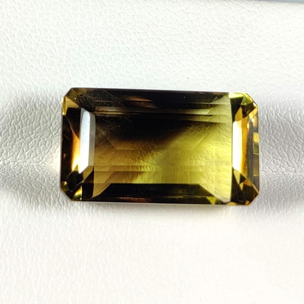 15.78 Ct Natural Bicolor Lemon Quartz Emerald Cut: Weight - 15.78 Ct / Size - 18.60 x 10.40 x 9.50 mm / Shape - Emerald Cut / Clarity - VVS / Origin - Brazil / Treatment - Heated
