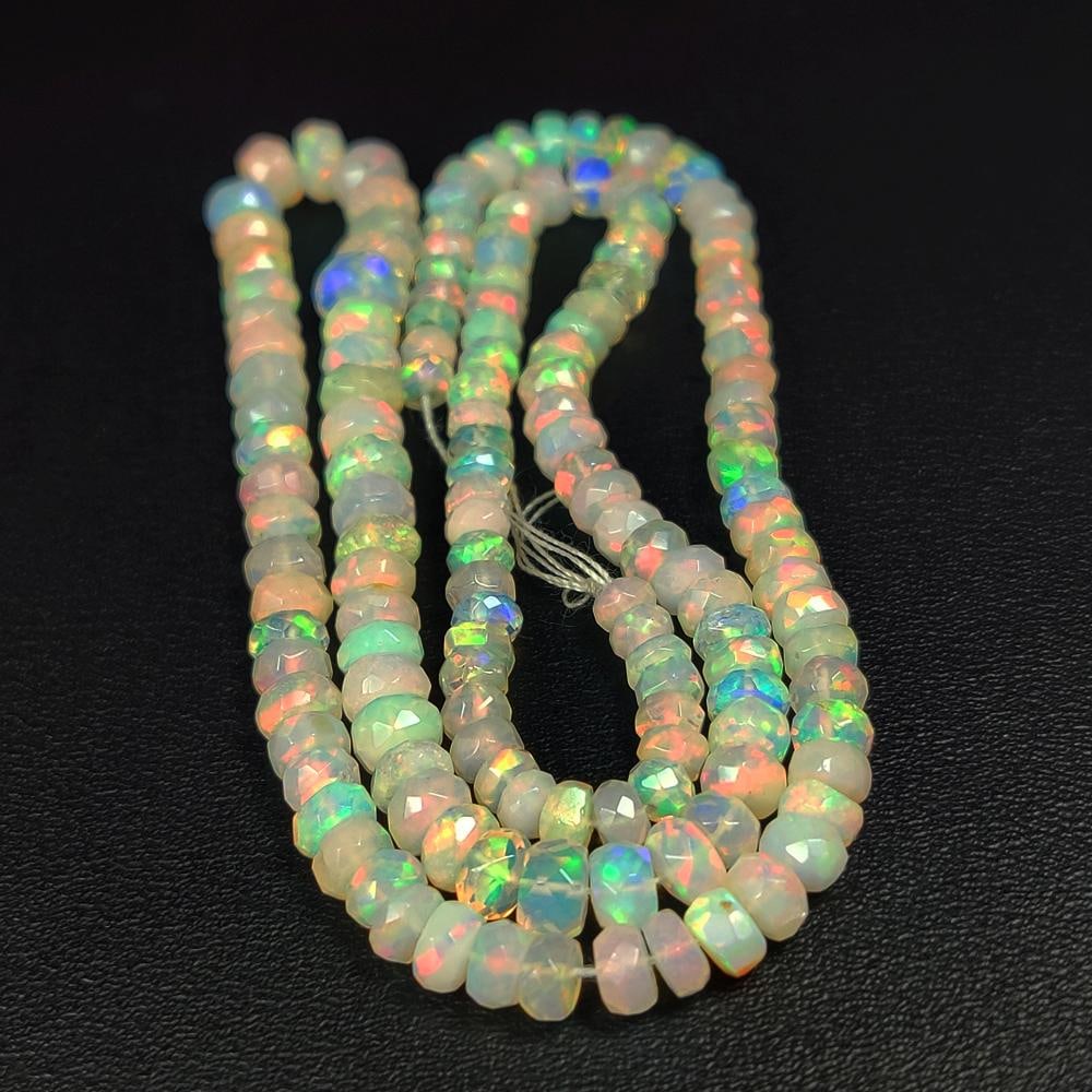 47.76 Ct Natural Multicolor Welo Opal Fire Round Beads: Weight - 47.76 Ct / Dimensions - 4.00 - 5.50 mm / 150 Pc's / 16" inches / Shape & Cut - Round Beads / Color - Multicolor / Transparency - Translucent / Origin - Ethiopia / Comments - None