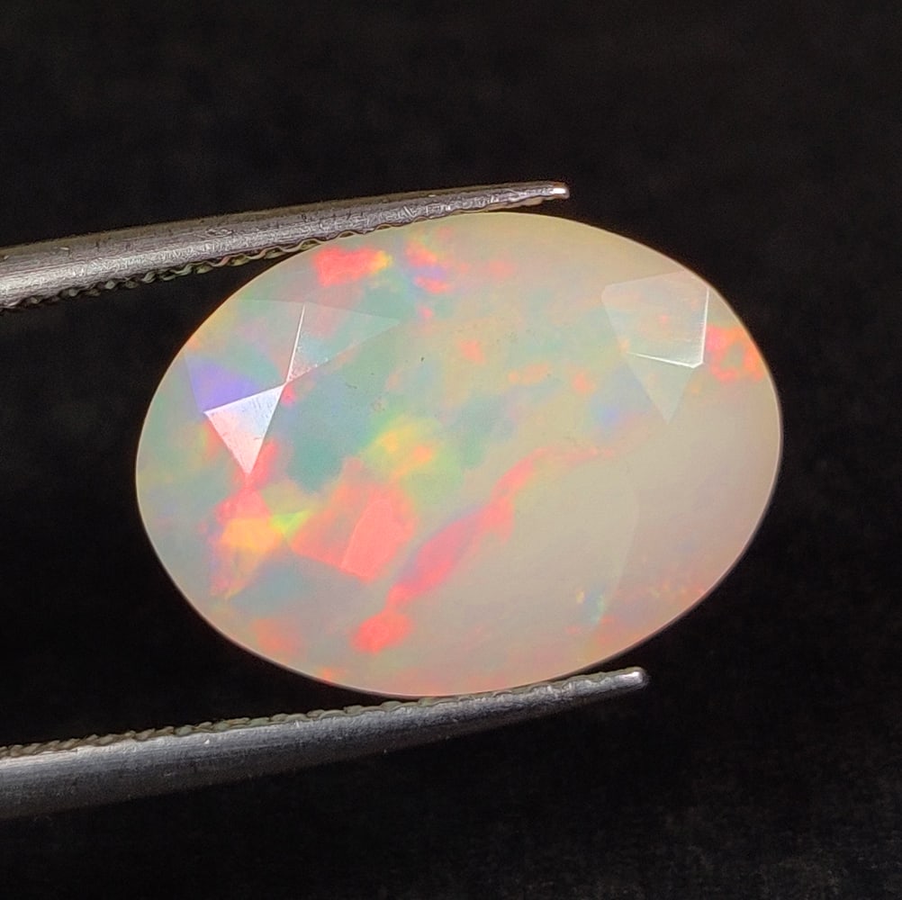 4.74 Ct Natural Multicolor Welo Opal Top Fire Oval Cut (1 of 2)