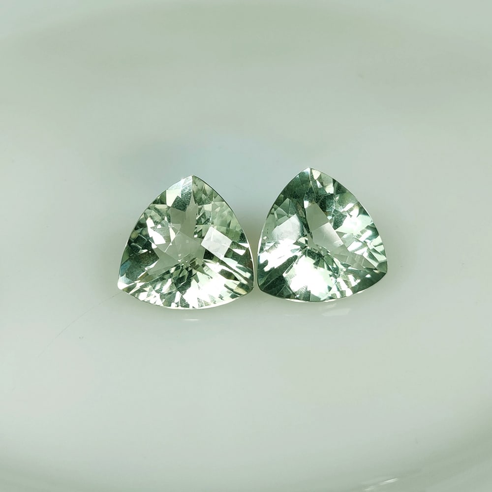 22.19 Ct Natural Green Amethyst Trillion Cut Pair: Weight - 22.19 Ct / Size - 16.10 x 15.90 x 9.20 mm / 2 PC's / Shape - Trillion Cut / Color - Green / Clarity - VVS / Origin - Brazil / Treatment - Heated