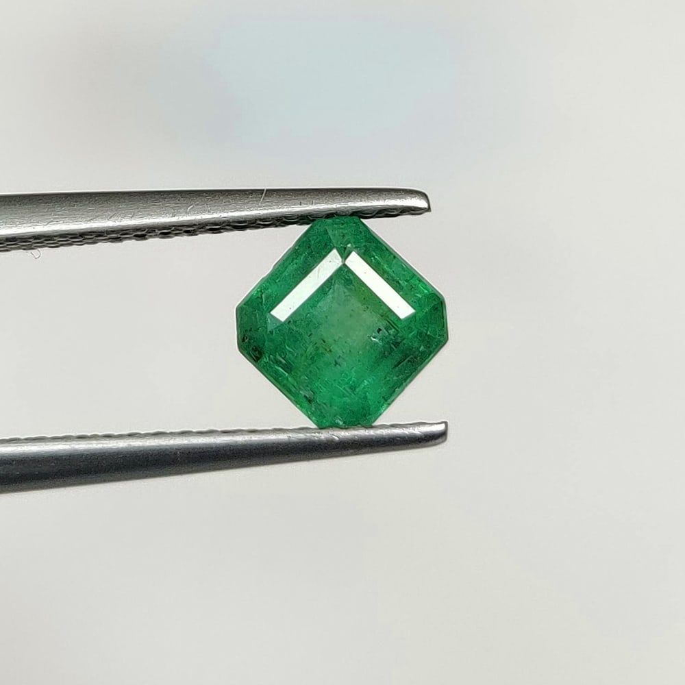 1.39 Ct Natural Zambian Emerald Square Octagon Cut: Weight - 1.36 Ct / Size - 6.00 x 5.90 x 5.10 mm / Shape - OCtagon Cut / Color - Green / Clarity - SI / Origin - Zambia / Treatment - Natural Emeralds are commonly enhanced by oil