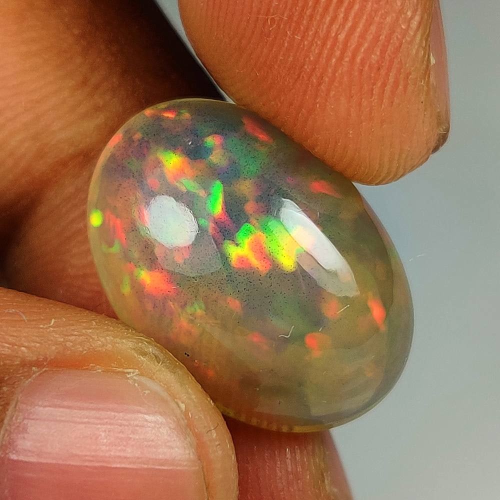 11.86 Ct Natural Multicolor Welo Opal Flash Fire Oval Cab (1 of 3)