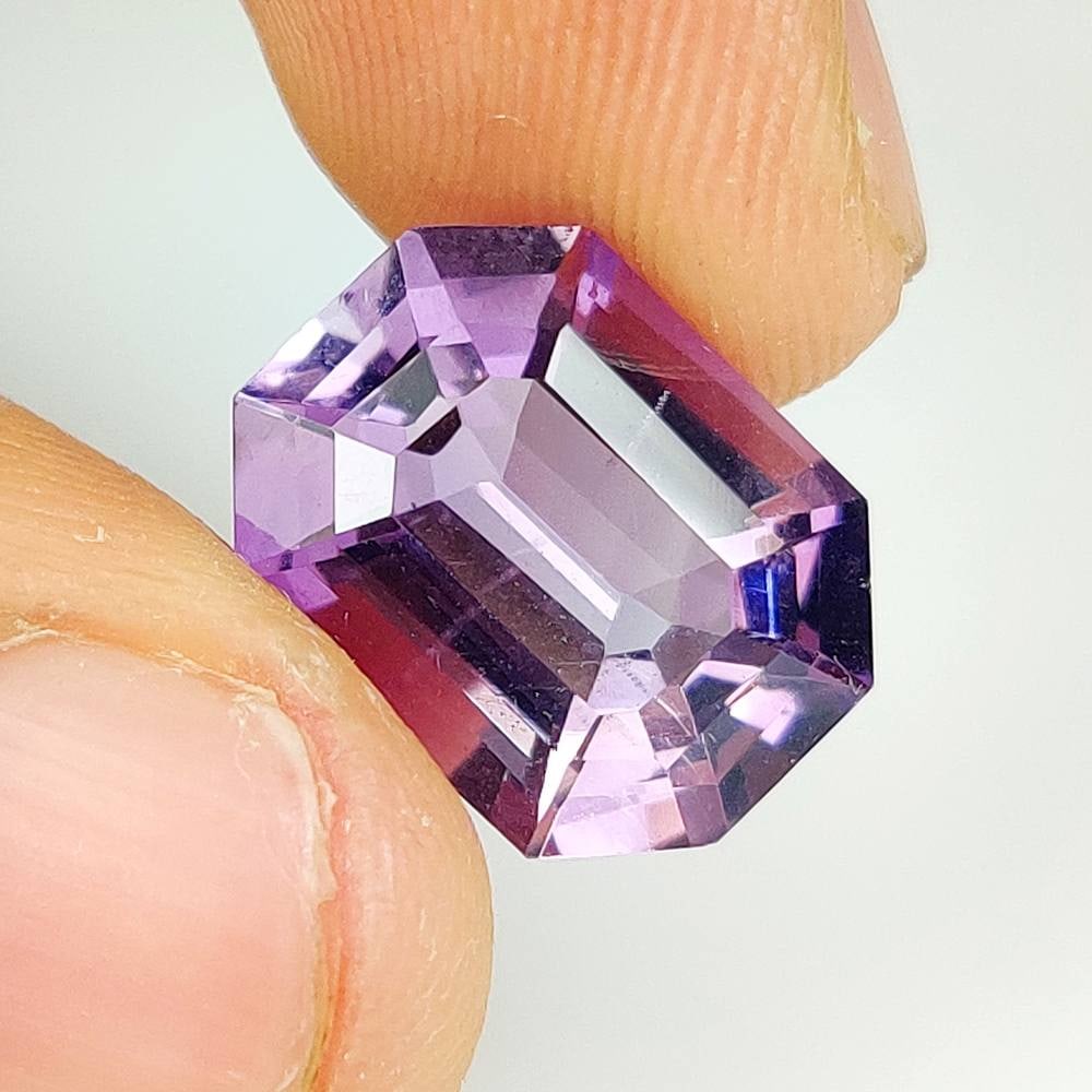 7.11 Ct Natural Purple Amethyst Asscher Cut: Weight - 7.11 Ct / Dimensions - 14.70 x 11.20 x 7.40 mm / Shape - Asscher cut / Color - Purple / Clarity - VVS / Origin -Brazil / Treatment - Heated