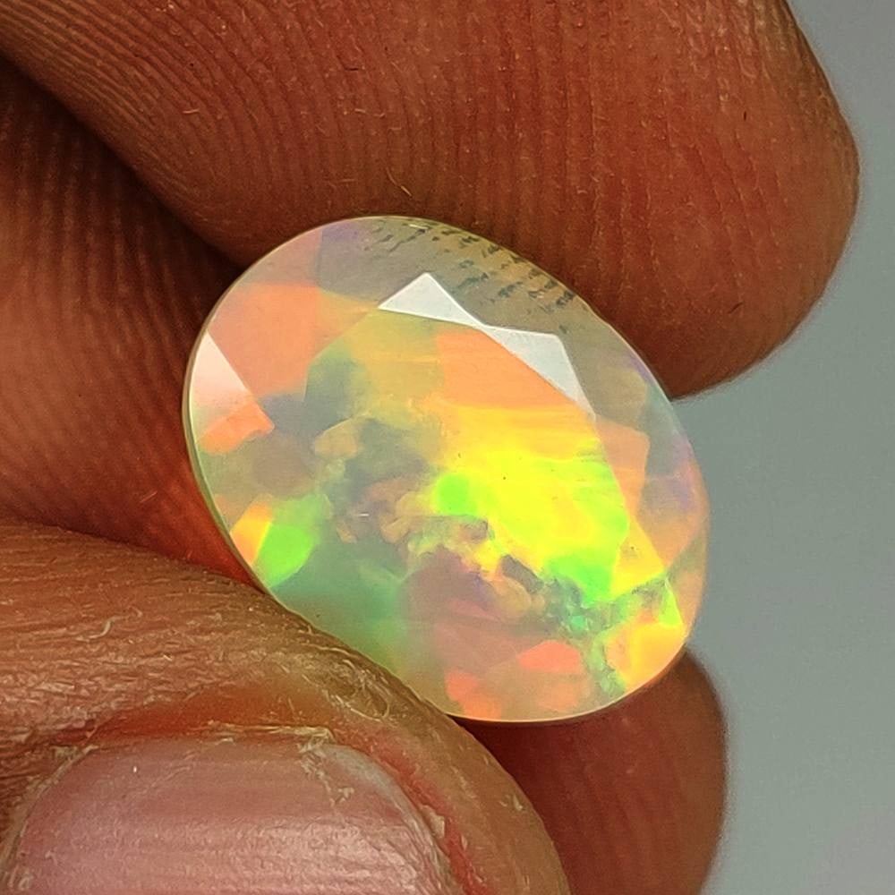 2.62 Ct Natural Multicolor Welo Opal Top Fire Oval Cut: Weight - 2.62 Ct / Dimensions - 11.90 x 9.00 x 7.10 mm / Shape - Oval Cut / Color - Multicolor / Clarity - Translucent / Origin - Ethiopia / Treatment - None