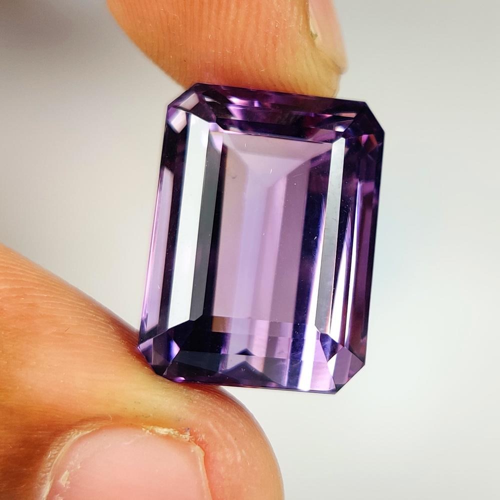 23.28 Ct Natural Purple Amethyst OCtagon Cut: Weight - 23.28 Ct / Size - 18.40 x 13.50 x 11.60 mm / Shape - Octagon Cut / Color - Purple / Clarity - VVS / Origin -Brazil / Treatment - Heated