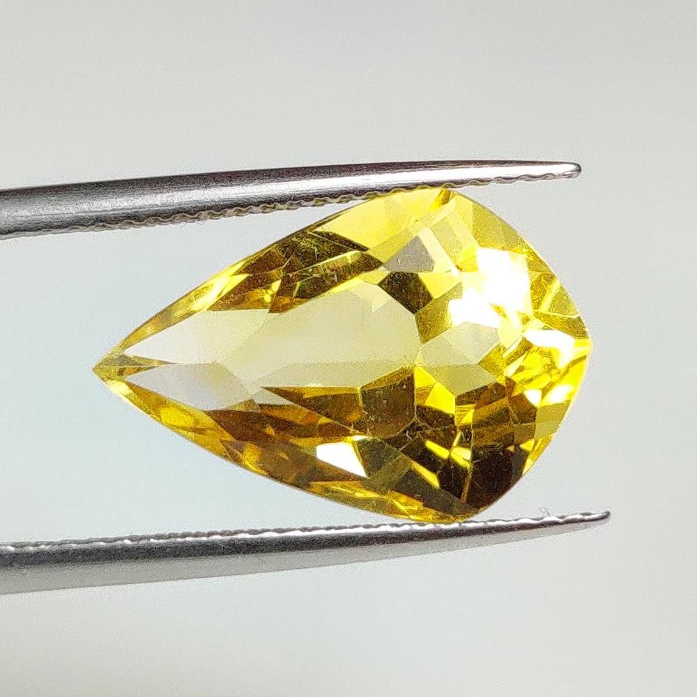 7.28 Ct Natural Yellow Citrine Fancy Cut: Weight - 7.28 Ct / Dimensions - 16.70 x 11.10 x 8.40 mm / Shape - Fancy Cut / Color - Yellow / Clarity - VVS / Origin - Brazil / Treatment - Heated