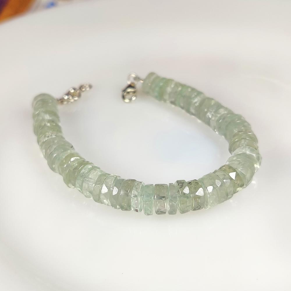 73.58 Ct Natural Green Amethyst Round Beads Bracelet: Weight - 73.58 Ct / Size - 7.50 - 7.80 mm / 56 Pc's / 7.25" inches / Shape - Round Beads / Color - Green / Clarity - VVS / Origin - Brazil / Treatment - Heated