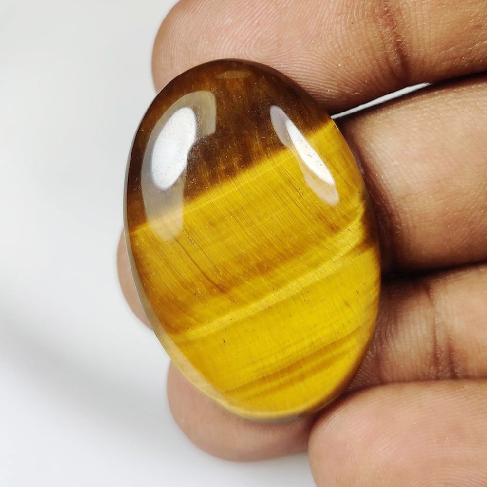 41.28 Ct Natural Tiger Eye Oval Cab (1 of 2)