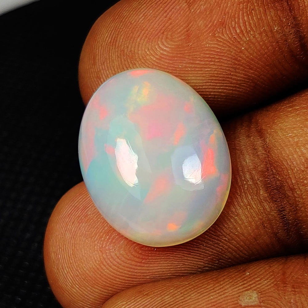 7.57 Ct Natural Multicolor Welo Opal Flash Fire Oval Cab (1 of 4)