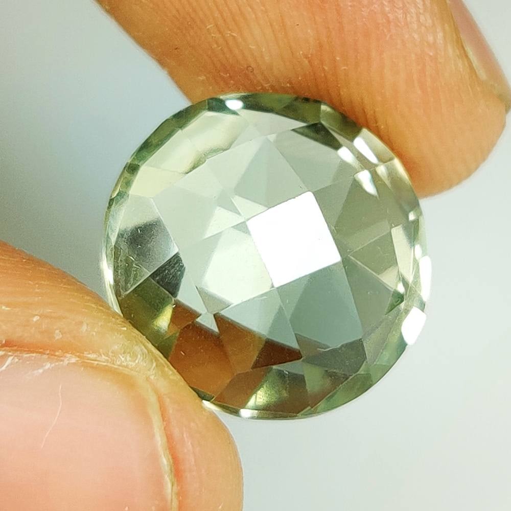 12.59 Ct Natural Green Amethyst Round Checkerboard Cut: Weight - 12.59 Ct / Size - 15.10 x 15.10 x 8.80 mm / Shape - Round Checkerboard Cut / Color - Green / Clarity - VVS / Origin - Brazil / Treatment - Heated
