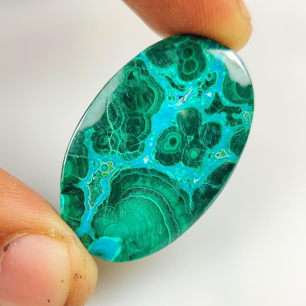 40.78 Ct Natural Azumalachite OVal Cab: weight - 40.78 Ct / Dimensions - 37.00 x 24.00 x 4.30 mm / Shape & Cut - Excellent OVal Cab / Origin - Russia / Comments - None