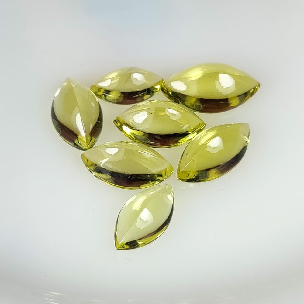 24.08 Ct Natural Lemon Quartz Marquise Cab Set: Weight - 24.08 Ct / Size - 12.5x6.9 - 14.7x8.1 mm / 7 Pc's / Shape - Marquise Cab / Clarity - VVS / Origin - Brazil / Treatment - Heated