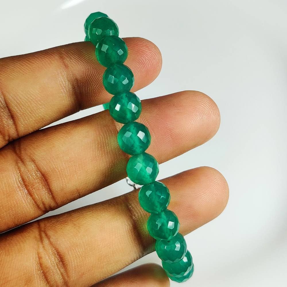 69.34 Ct Natural Green Onyx 7" Round Beads bracelet: Weight - 69.34 Ct / Dimensions - 8.00 - 8.30 mm / 19 Pc's / 7" inches / Shape - Round Cut Beads / Clarity - Semi Transparent / Origin - Brazil / Treatment - None
