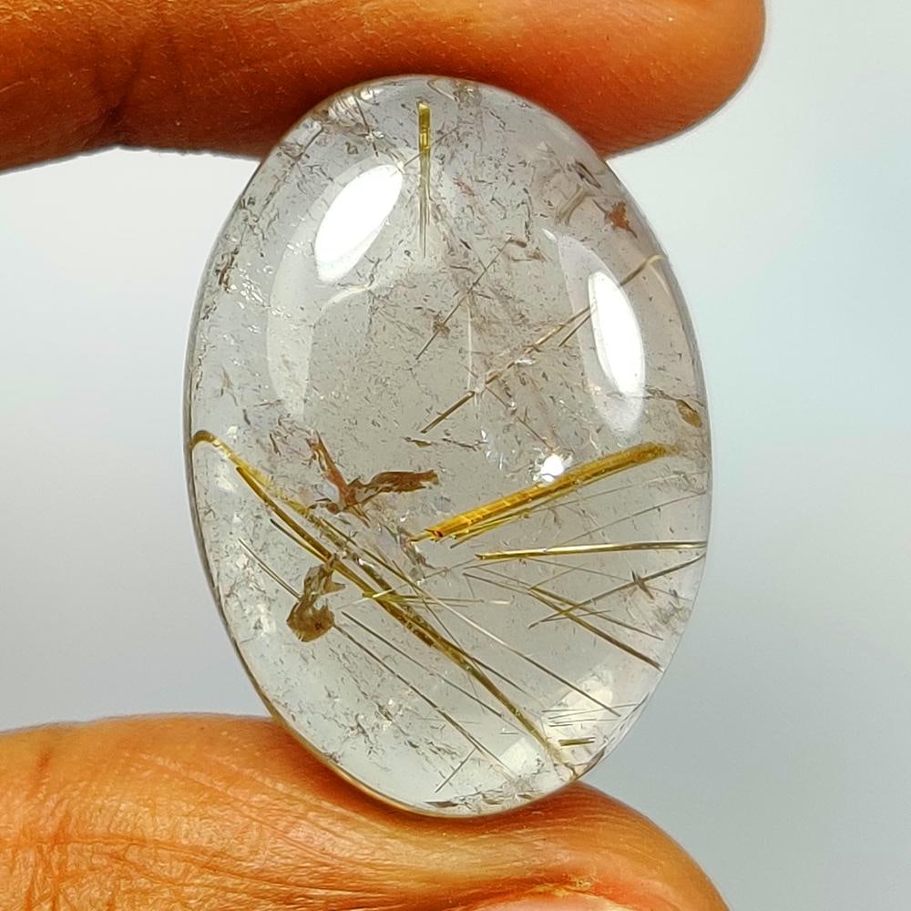 22.39 Ct Natural Golden Rutile Quartz Oval Cab: Weight - 22.39 Ct / Dimensions -24.00 x 16.10 x 7.50 mm / Shape & Cut - Oval Cab / Transparency - Transparent / Origin - Norway / Comments - None