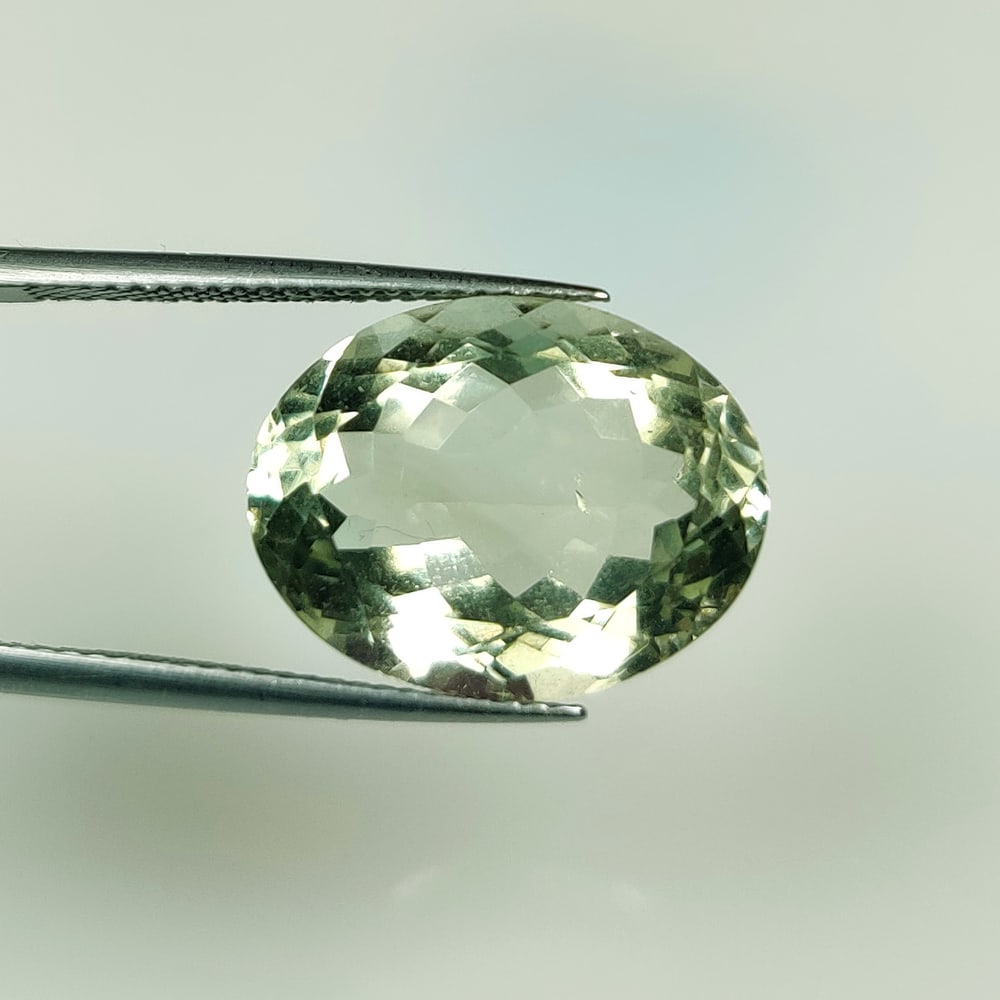 10.59 Ct Natural Green Amethyst Oval Cut: Weight - 10.59 Ct / Dimensions - 17.00 x 13.10 x 8.00 mm / Shape - Oval Cut / Color - Green / Clarity - VVS / Origin -Brazil / Treatment - Heated