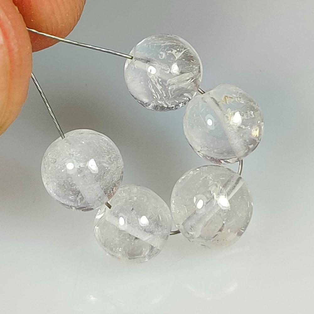 13.06 Ct Natural Colorless Quartz Round Beads (1 of 2)