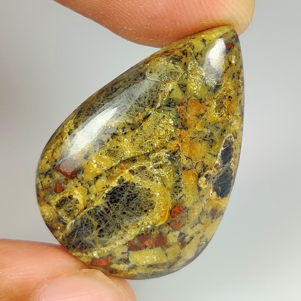 23.05 Ct Natural Peanut Obsidian Pear Cab (1 of 2)