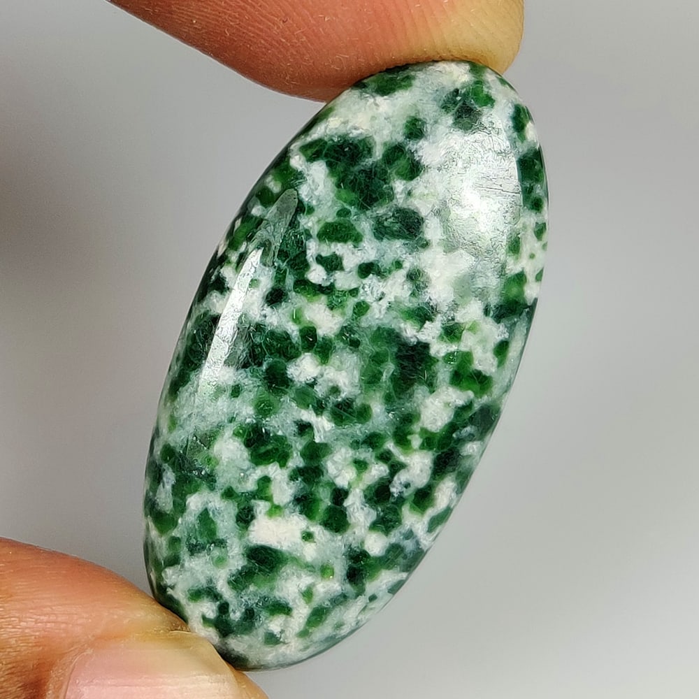 29.72 Ct Natural Diopside Oval Cab: Weight - 29.72 Ct / Dimensions - 37.00 x 17.40 x 5.20 mm / Shape - Oval Cab / Color - Green / Clarity - Opaque / Origin - Brazil / Treatment - None