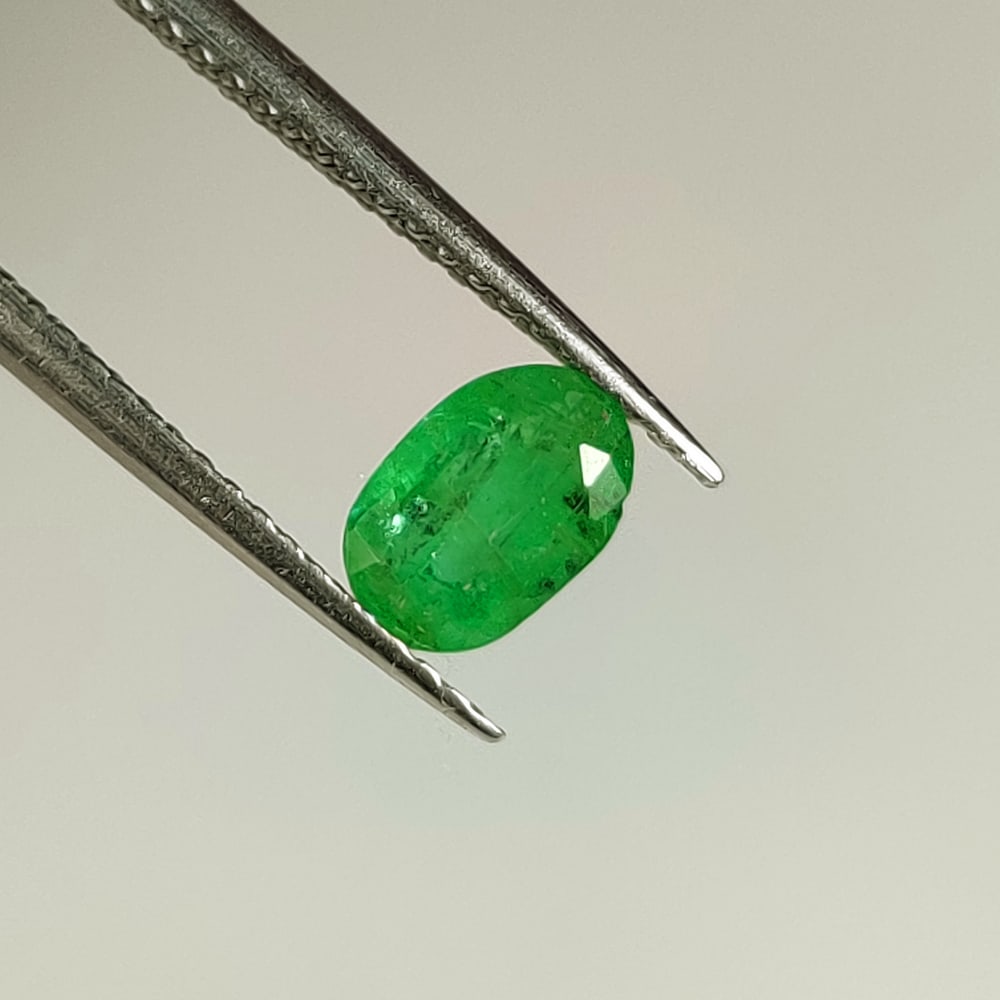 0.64 Ct Natural Zambian Green Emerald Oval Cut (1 of 3)