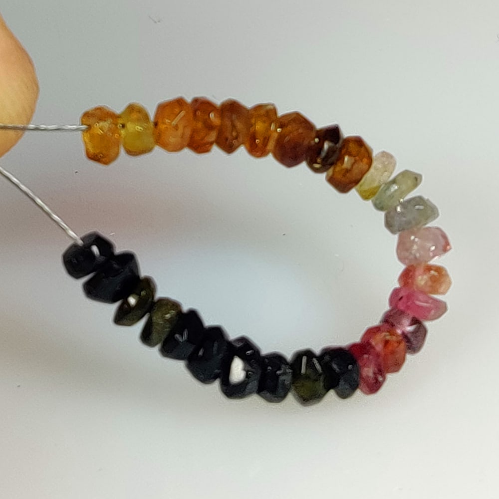 5.88 Ct Natural Multicolor Tourmaline Round Cut Beads: Weight - 5.88 Ct / Size - 2.90 - 3.40 mm / 28 Pc's / Shape - Round Cut Beads / Color - Multicolor / Clarity - VVS / Origin - Mozambique / Treatment - None