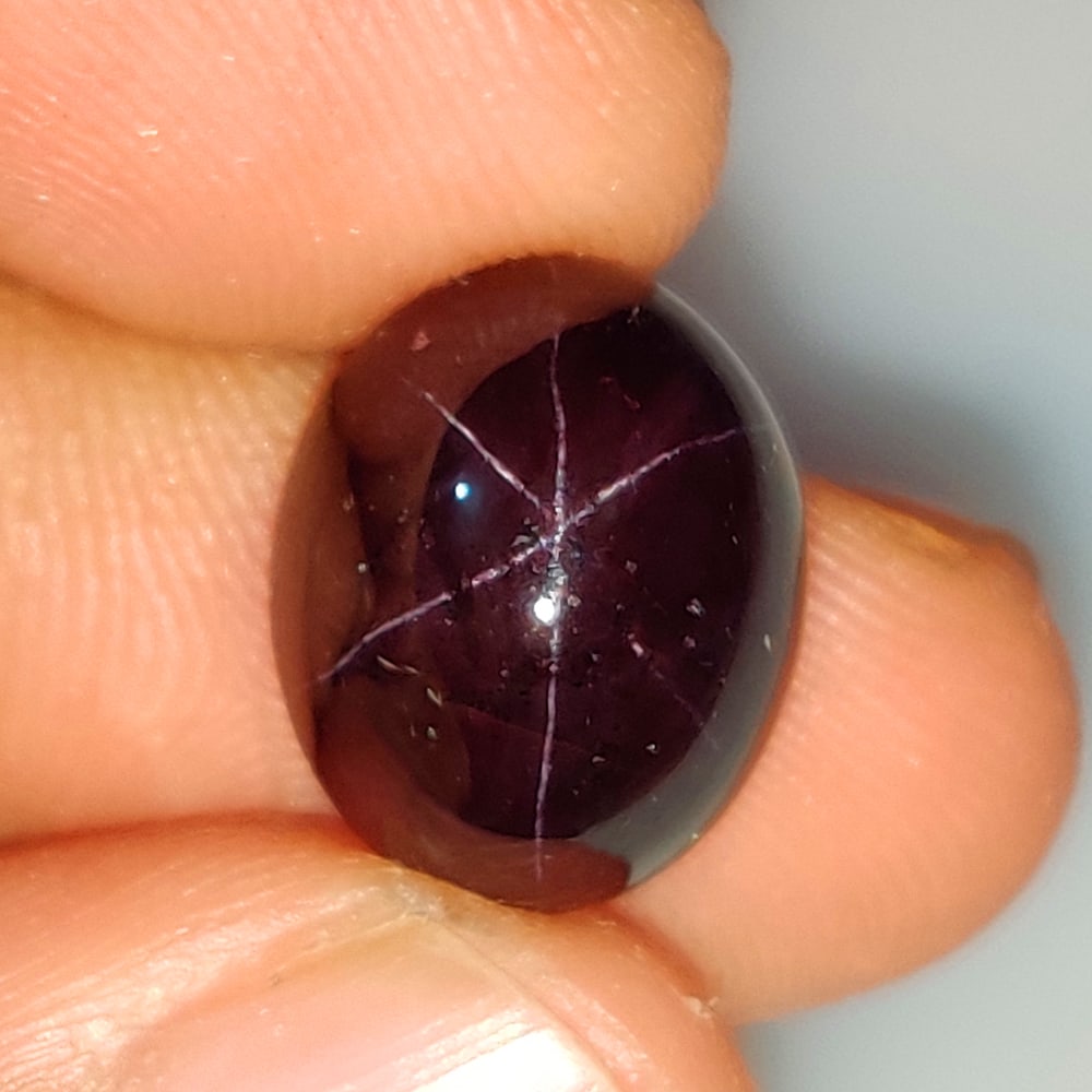 15.82 Ct Natural Star Garnet Oval Cab (1 of 2)