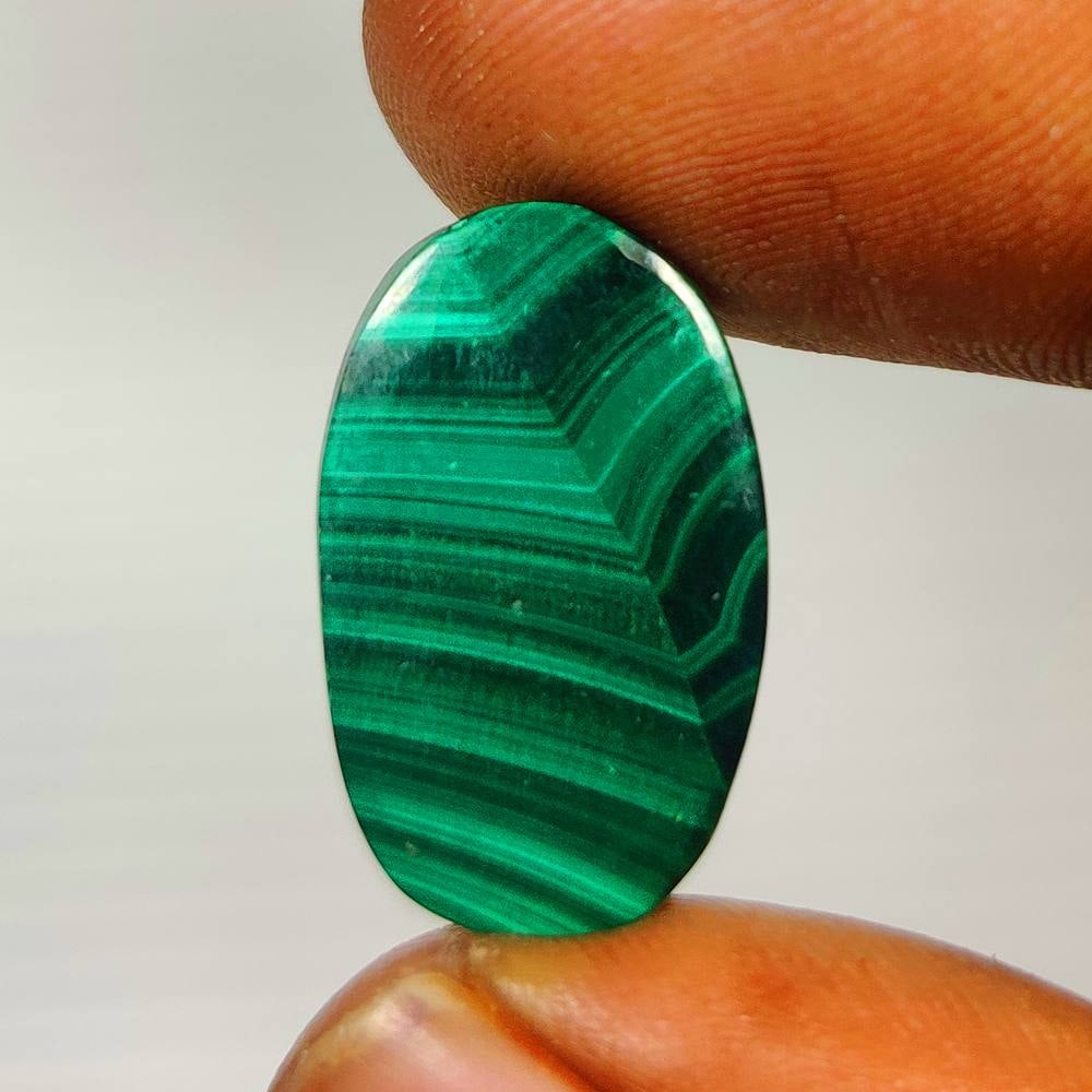 17.91 Ct Natural Green Malachite Oval Cab: Weight - 17.91 Ct / Dimensions - 20.20 x 12.60 x 5.00 mm / Shape - Oval Cab / Color - Green / Clarity - Opaque / Origin - Pakistan / Treatment - None