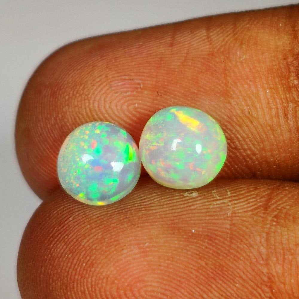 2.32 Ct Natural Multicolor Welo Opal Flash Fire Round Cab Set (1 of 2)