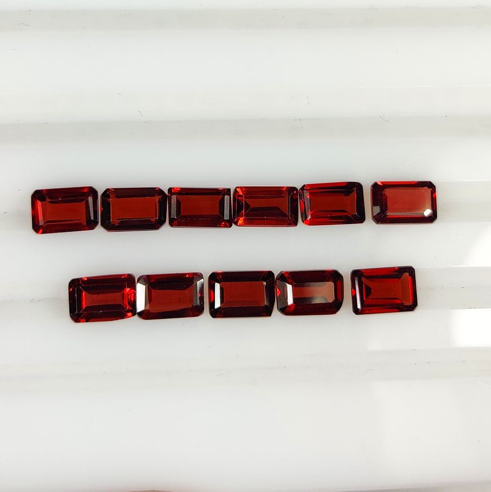 7.33 Ct Natural Almandite Garnet Octagon Cut Set: Weight - 7.33 Ct / Dimensions - 6.0x4.0 - 6.2x4.2 mm / 11 Pc's / Shape - Octagon Cut / Clarity - VVS / Origin - Nigeria / Treatment - None