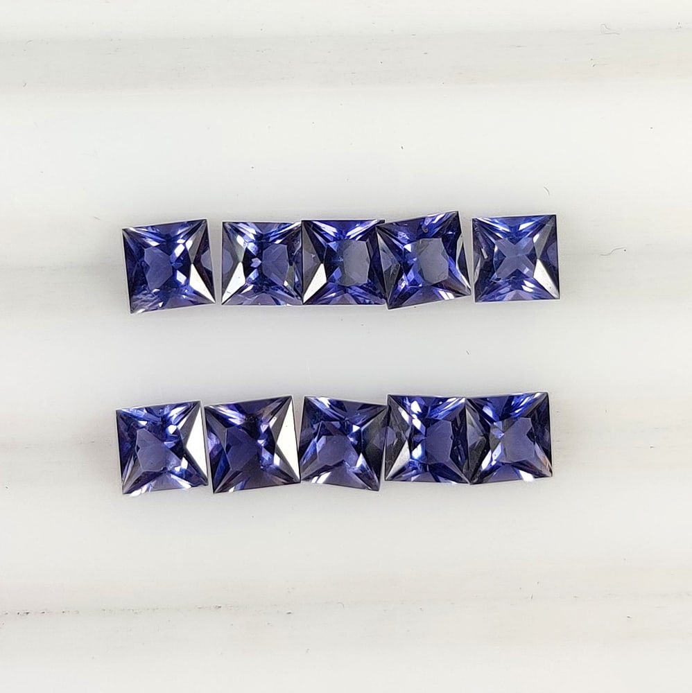 2.57 Ct Natural Violet-Blue Iolite Square Cut Set: Weight - 2.57 Ct / Dimensions - 4.0x4.0 - 4.1x4.1 mm / 10 Pc's / Shape - Square Cut / Color - Violet / Clarity - VVS / Origin - Brazil / Treatment - None