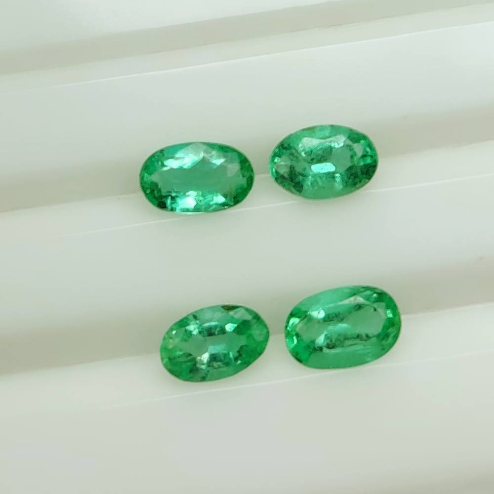 1.61 Ct Natural Zambian Emerald Oval Cut Set: Weight - 1.61 Ct / Size - 5.9x3.8 - 6.2x4.2 mm / 4 Pc's / Shape - Oval Cut / Color - Green / Clarity - SI / Origin - Zambia / Treatment - Natural Emeralds are commonly enhanced by oil