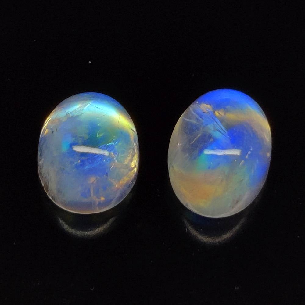 8.38 Ct Natural Blue Tint Moonstone Oval Cab Pair: Weight - 8.38 Ct / Size - 10.60 x 8.20 x 6.70 mm / 2 Pc's / Shape - Oval Cab / Clarity - Semi-Transparent / Origin - India / Treatment - None