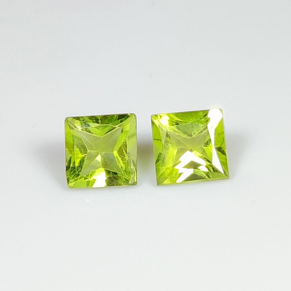 1.41 Ct Natural Green Peridot Square Cut Pair: Weight - 1.41 Ct / Dimensions - 5.00 x 5.00 x 3.50 mm / 2 Pc's / Shape - Square Cut / Color - Green / Clarity - VVS / Origin - Pakistan / Treatment - None