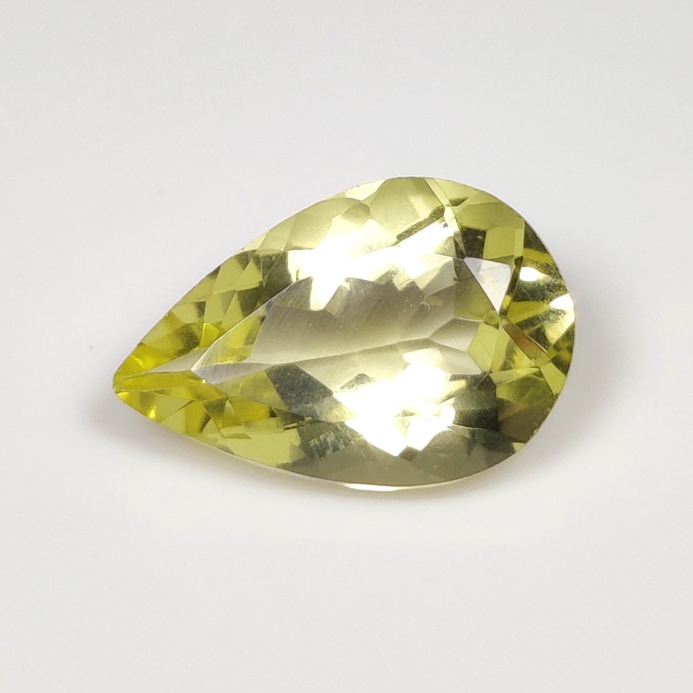 8.30 Ct Natural Lemon Quartz Pear Cut: Weight - 8.30 Ct / Size - 18.30 x 12.00 x 7.60 mm / Shape - Pear Cut / Clarity - VVS / Origin - Brazil / Treatment - Heated