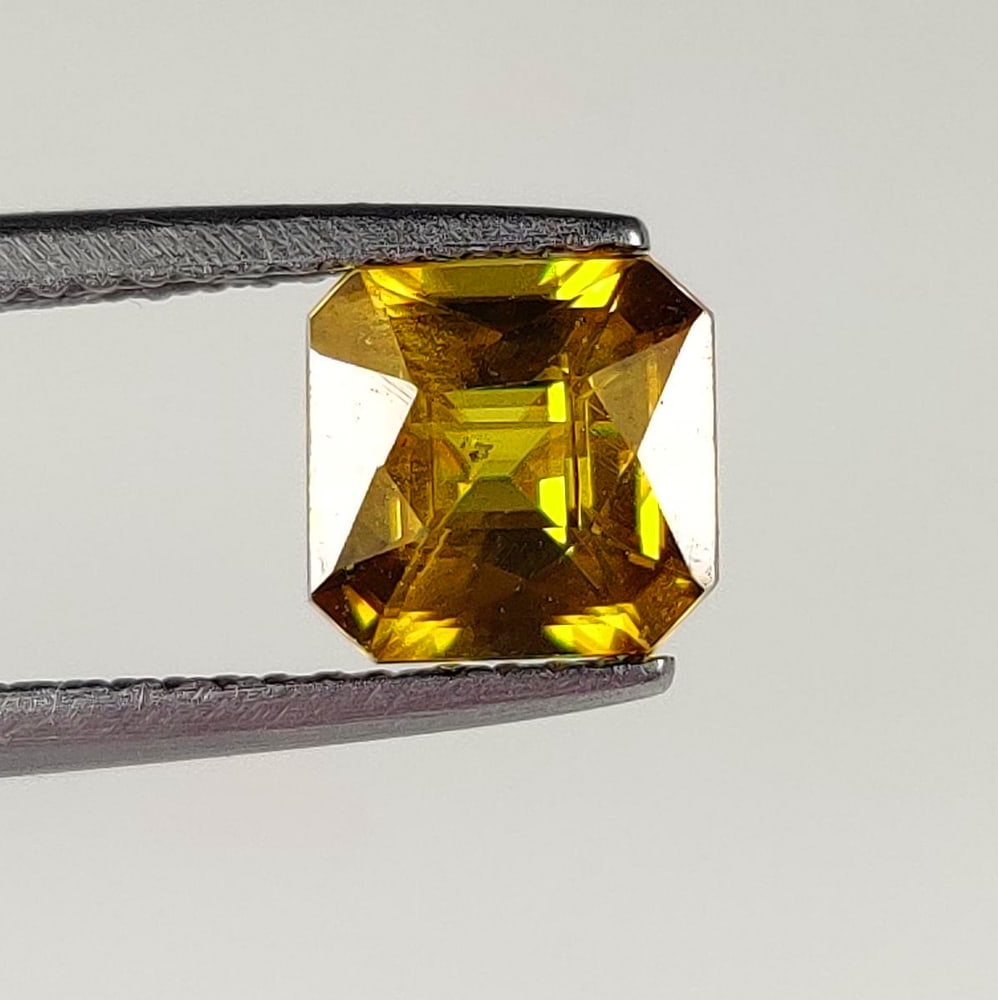1.82 Ct Natural Sphene Square Octagon Cut: Weight : 1.82 Ct / Dimensions : 7.00 x 6.80 x 4.30 mm / Shape : Square Octagon Cut / Color : Yellow / Transparency : Transparent / Treatment : No any treatment