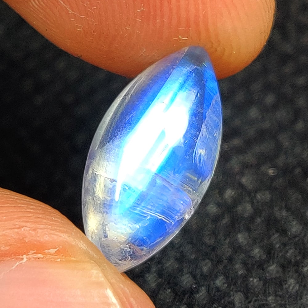 4.73 Ct Natural Blue Tint Moonstone Marquise Cab: Weight - 4.73 Ct / Size - 16.00 x 7.80 x 5.50 mm / Shape - Marquise Cab / Clarity - Semi-Transparent / Origin - India / Treatment - None