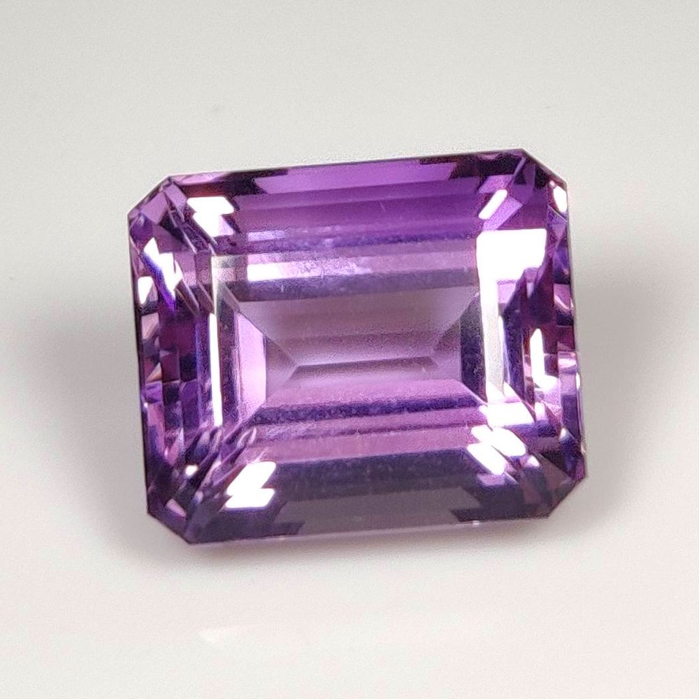 13.51 Cts Natural Purple Amethyst Octagon Cut: Weight - 13.51 Ct / Dimensions - 14.80 x 12.40 x 9.80 mm / Shape - Octagon Cut / Color - Purple / Clarity - VVS / Origin -Brazil / Treatment - Heated