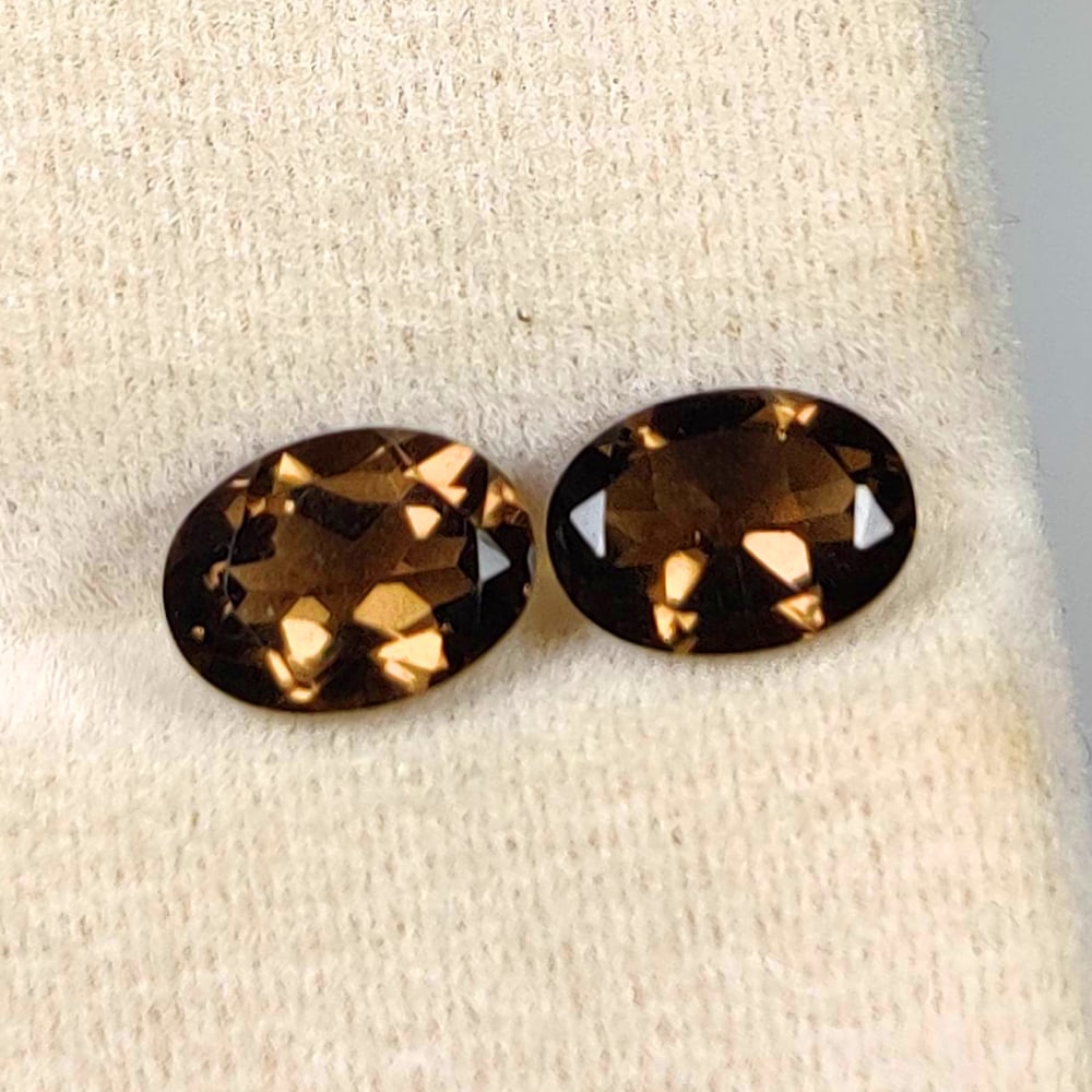 1.48 Ct Natural Choco Smoky Quartz Excellent Oval Cut Pair: Weight - 1.48 Ct / Size - 7.00 x 5.20 x 3.70 mm / 2 Pc's / Clariry - VVS / mm / Top Quality Luster / Excellent Oval Cut / Origin - Brazil / Treatment - None