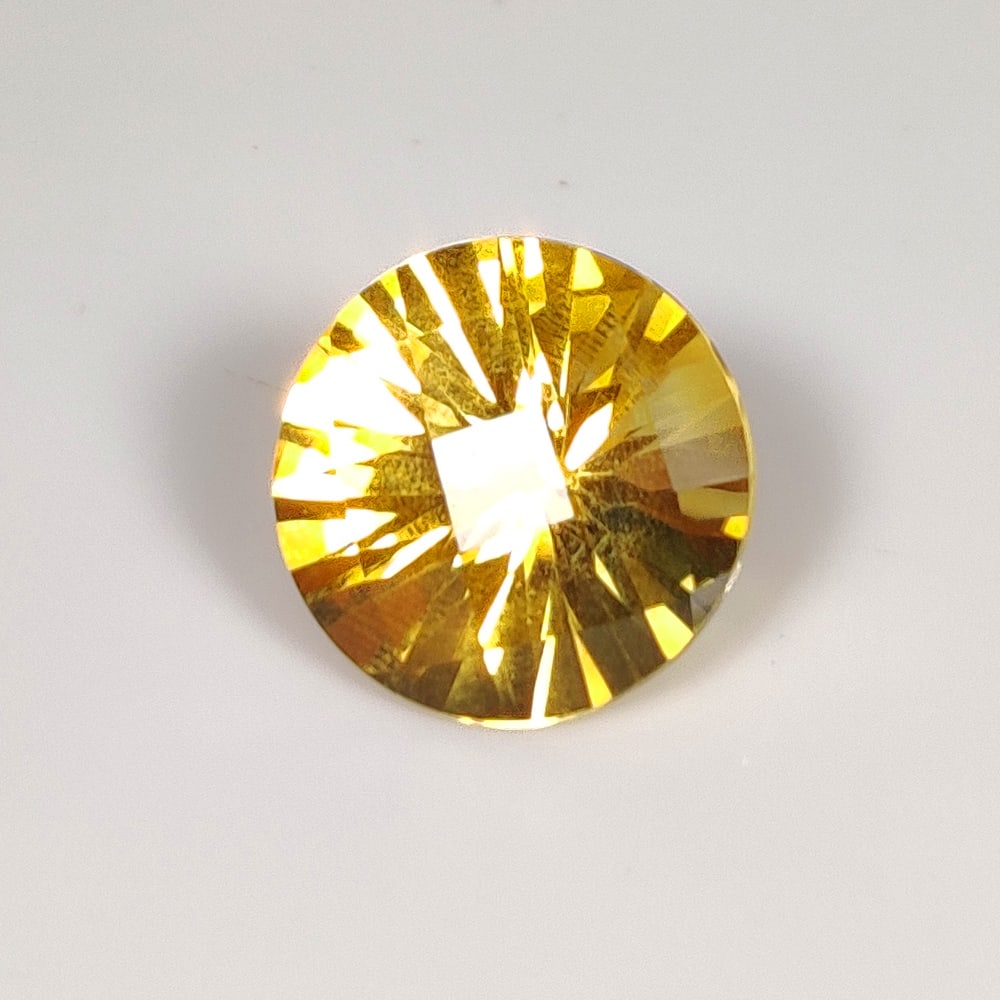 6.24 Ct Natural Yellow Citrine Round Checkerboard Cut: Weight - 6.24 Ct / Dimensions - 13.00 x 13.00 x 8.40 mm / Shape & Cut - Round Cut / Color - Yellow / Transparency - VVS / Origin - Brazil / Comments - Heated