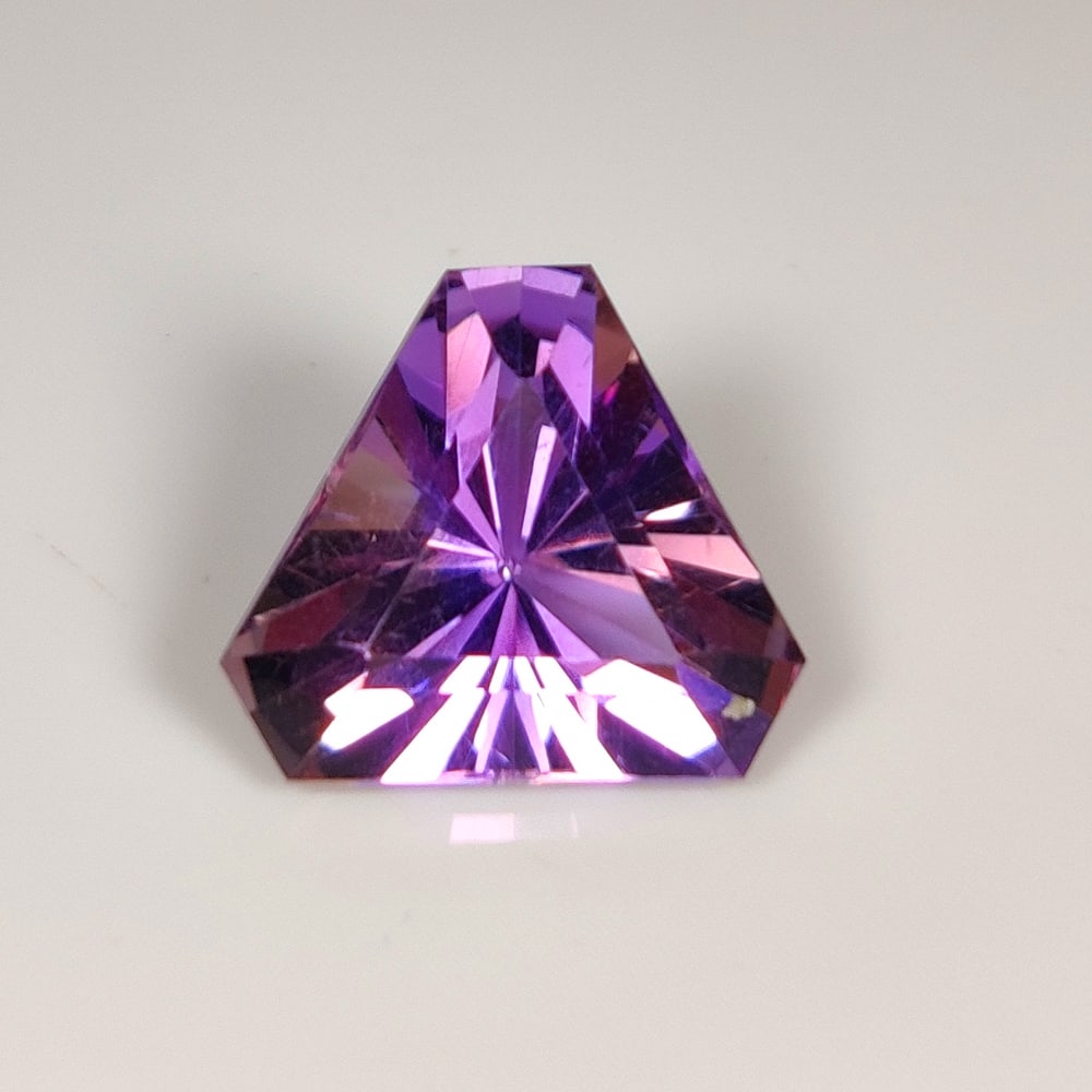 9.29 Ct Natural Bicolor Ametrine Fancy Trillion Cut: Weight - 9.29 Ct / Dimensions - 14.50 x 14.50 x 9.30 mm / Shape - Trillion Cut / Color - Bicolor / Clarity - VVS / Origin -Brazil / Treatment - None