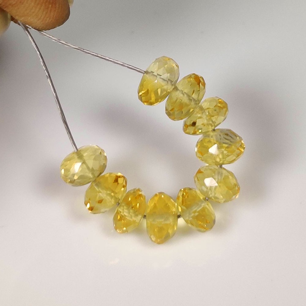 9.15 Ct Natural Yellow Citrine Round Cut Beads: Weight - 9.15 Ct / Size - 5.90 - 6.30 mm / 10 Pc's / Shape - Round Cut Beads / Color - Yellow / Clarity - VVS / Origin - Brazil / Treatment - Heated
