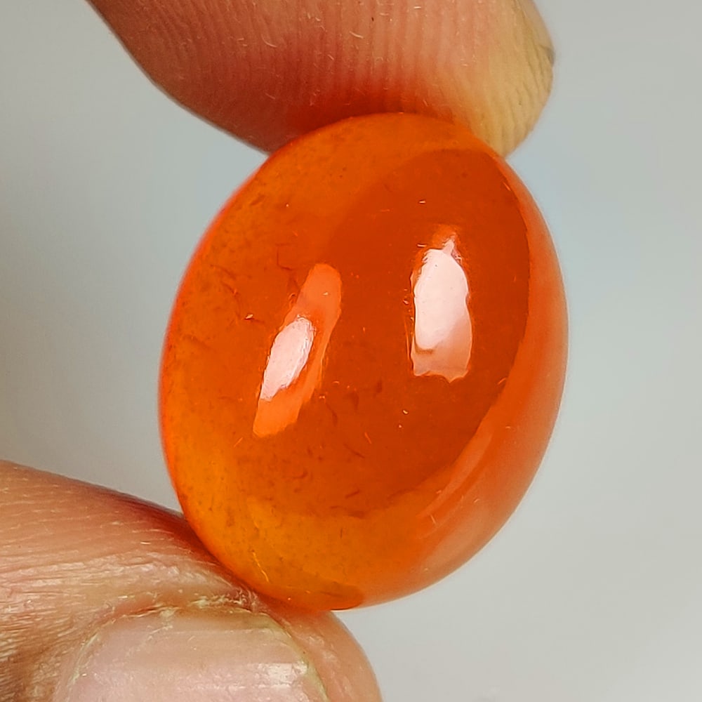 16.04 Ct Natural Carnelian Oval cab: Weight - 16.04 Ct / Dimensions - 17.40 x 13.60 x 9.00 mm / Shape & Cut - Oval cab / Transparency - Semi - Opaque / Origin - Brazil