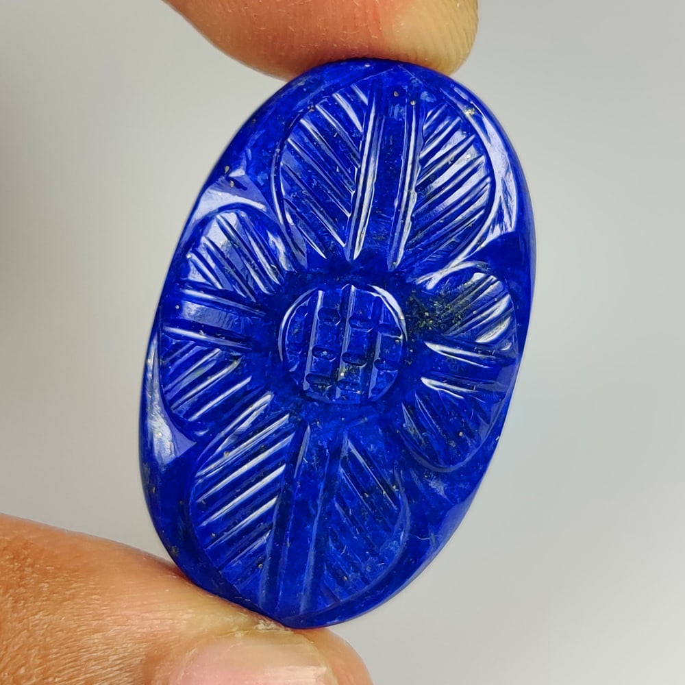 42.02 Ct Natural Blue Lapis Lazuli Oval carving Cab: Weight - 42.02 Ct / Size - 33.00 x 20.40 x 6.50 mm / Shape - OVal Cab / Clarity - Opaque / Origin - Afghanisthan / Treatment - None