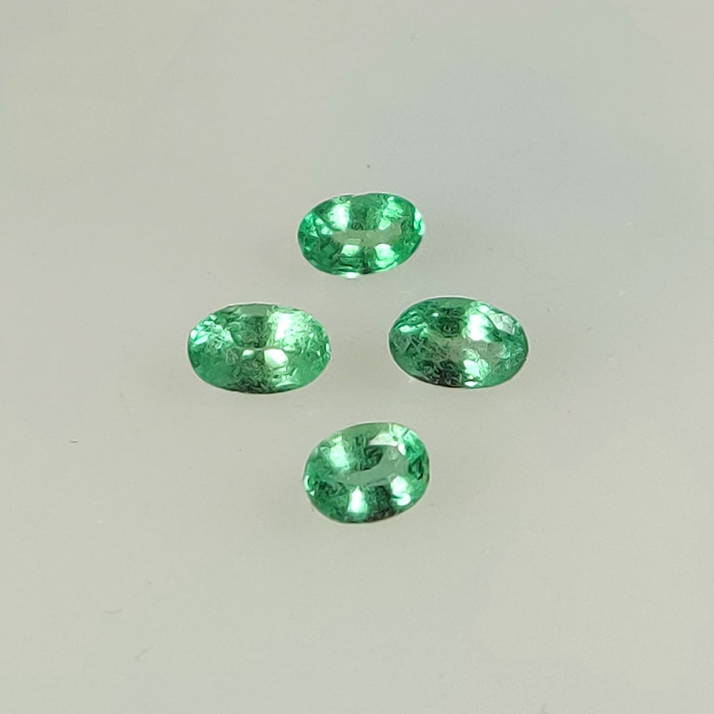 0.92 Ct Natural Zambian Green Emerald Oval Cut Set (1 of 3)