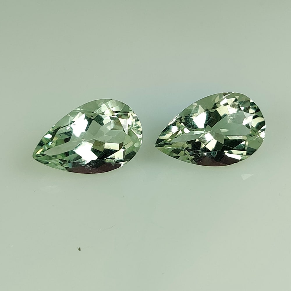 8.41 Ct Natural Green Amethyst Pear Cut Pair: Weight - 8.41 Ct / Size - 14.20 x 9.20 x 6.50 mm / 2 PC's / Shape - Pear Cut / Color - Green / Clarity - VVS / Origin - Brazil / Treatment - Heated