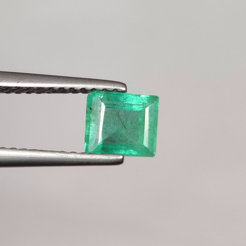 0.86 Ct Natural Zambian Green Emerald - Octagon Cut: Weight - 0.86 Ct / Dimensions - 5.70 x 5.10 x 3.70 mm/ Shape - Octagon Cut / Color - Green / Clarity - SI / Origin - Zambia / Treatment - Natural Emeralds are commonly enhanced by oil