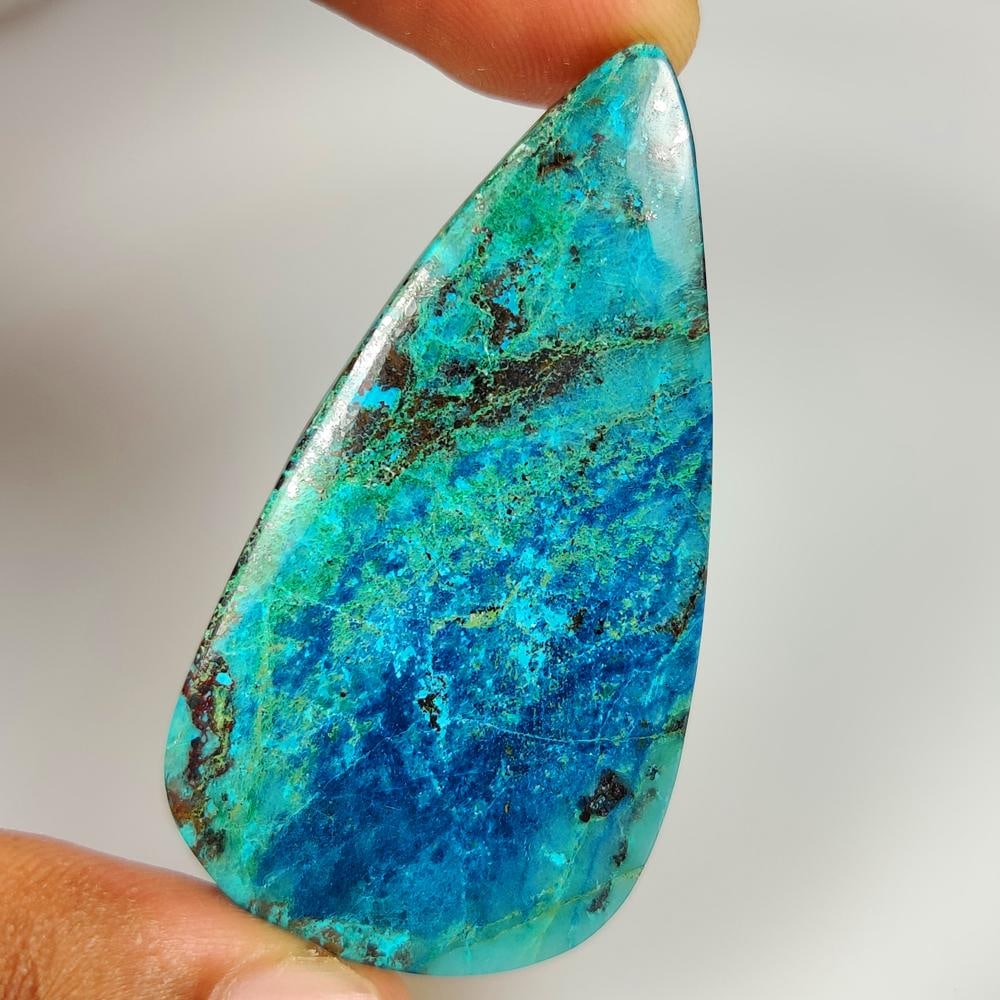 64.85 Ct Natural Tibetian Blue Turquoise Pear Cab: Weight - 64.85 Ct / Size - 57.00 x 30.00 x 4.70 mm / Good Color / Oval Cabochon - Ready for Jewellery Setting / Origin - Tibet / Treatment - None