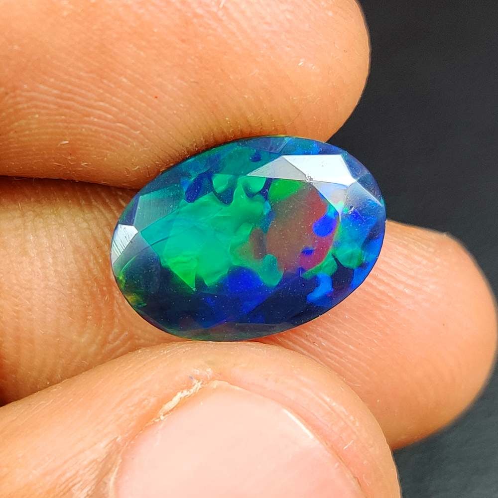 2.80 Ct Natural Black Fire Opal Oval Cut (1 of 3)