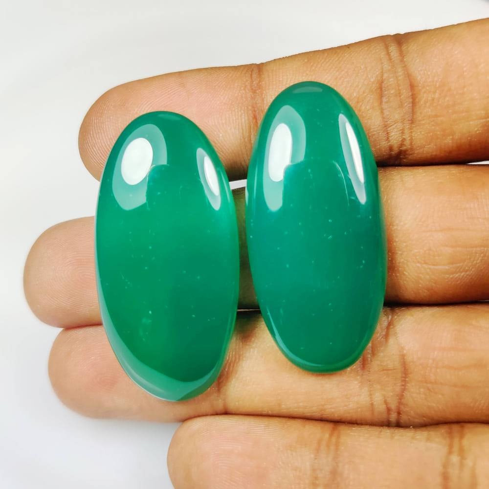 80.13 Ct Natural Green Onyx Oval Cab Pair: Weight - 80.13 Ct / Size - 40.00 x 19.20 x 6.70 mm / 2 Pc's / Shape - Oval Cab / Clarity - Transparent / Origin - Brazil / Treatment - None