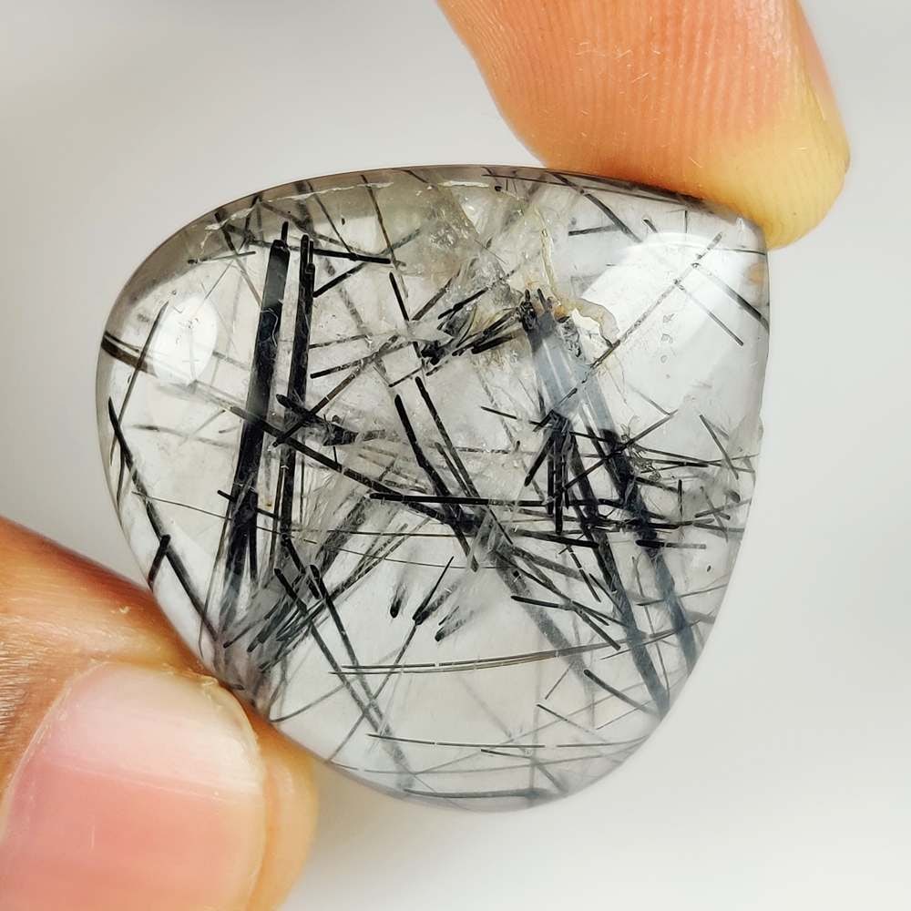 55.10 Ct Natural Rutile Quartz Pear Cab: Weight - 55.10 Ct / Dimensions - 31.00 x 31.00 x 9.40 mm / Shape & Cut - Pear Cab / Transparency - Transaprent / Origin - Norway / Comments - None