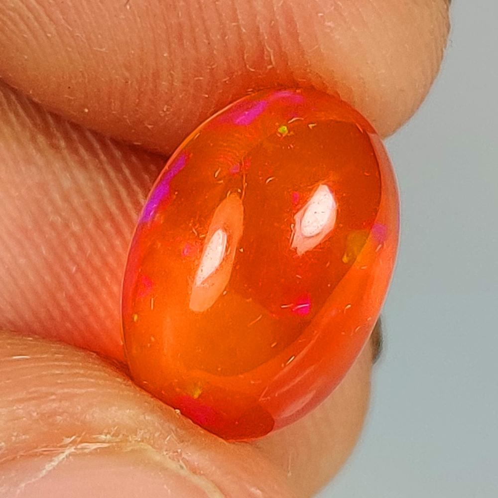 2.03 Ct Natural Orange Fire Opal Oval Cab (1 of 2)
